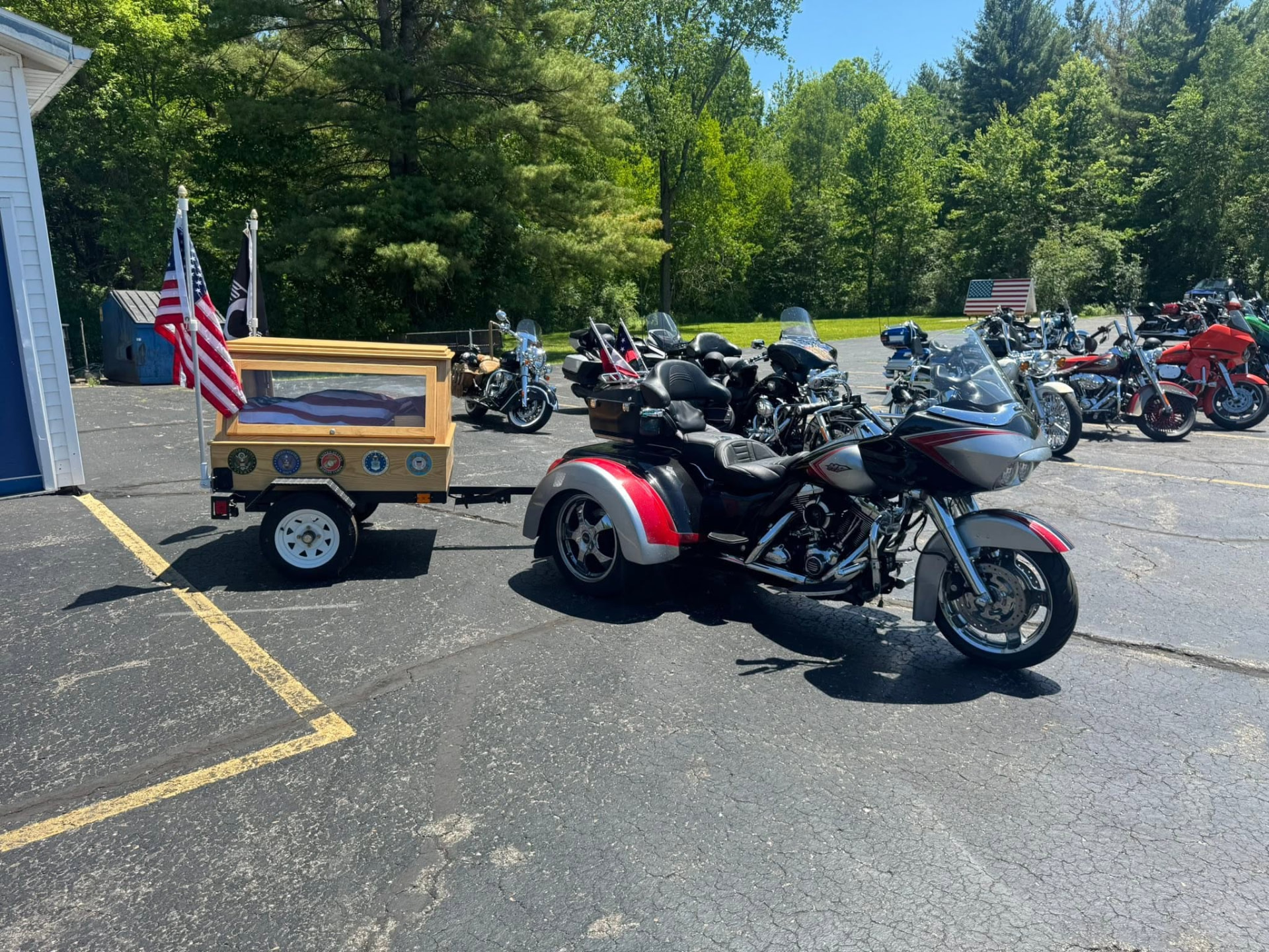 Chapter #443 motorcycle and trike escort with a flag-draped memorial case at a final escort ceremony